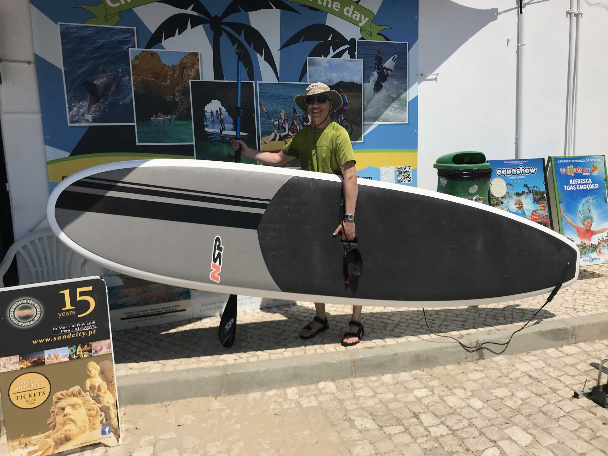 a man with a paddle board