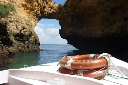 a boat sitting on top of a mountain